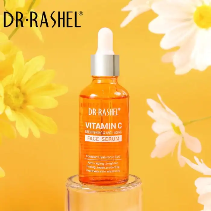 Dr. Rashel Vitamin C Face Serum bottle with dropper, promoting brightening and anti-aging benefits, displayed with yellow and white daisies on a vibrant yellow background