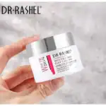 Hand holding Dr Rashel Whitening Day Cream jar with Arbutin and Niacinamide formula