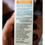 Backside label of Garnier Bright Complete 30X Vitamin C Booster Serum 30ml showing product description, directions for use, ingredients, manufacturing details, and contact information.
