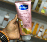 Vaseline Gluta-Hya Dewy Radiance Lotion pink tube, 330ml, held in hand