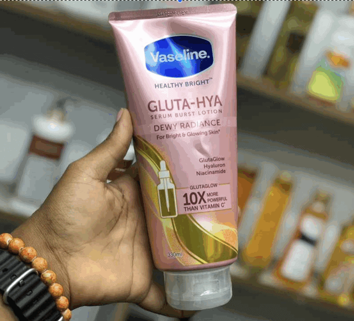 Vaseline Gluta-Hya Dewy Radiance Lotion pink tube, 330ml, held in hand