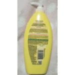 Back view of Garnier Bright Complete Vitamin C Body Serum Lotion yellow bottle, 400ml, showing product details and barcode