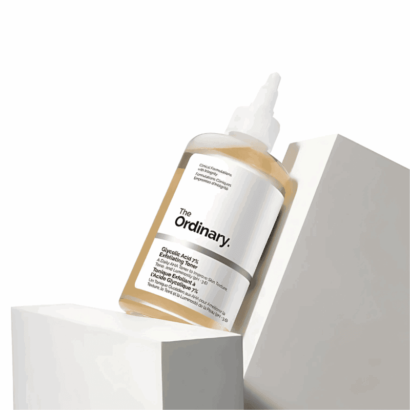 The Ordinary Glycolic Acid 7% Exfoliating Toner (100ml) bottle displayed on angled white blocks.