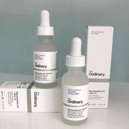 Two bottles of The Ordinary Niacinamide 10% + Zinc 1% serum placed with white product boxes, minimalistic packaging design, high-strength blemish and oil-control serum for clearer skin.