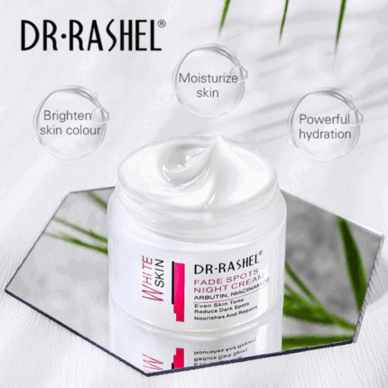 Open jar of Dr Rashel White Skin Fade Spots Night Cream with creamy white texture, placed on a reflective mirror surface. Text highlights benefits: brighten skin tone, moisturize skin, and provide powerful hydration.