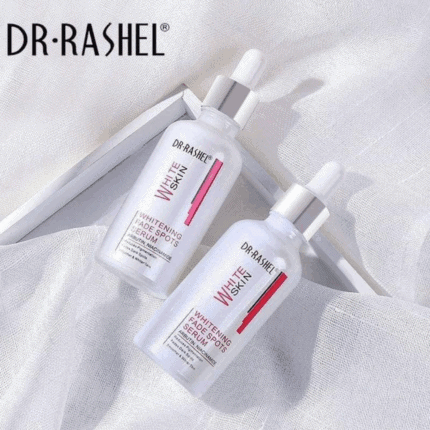 Two bottles of Dr Rashel Whitening Fade Spots Serum placed on white fabric