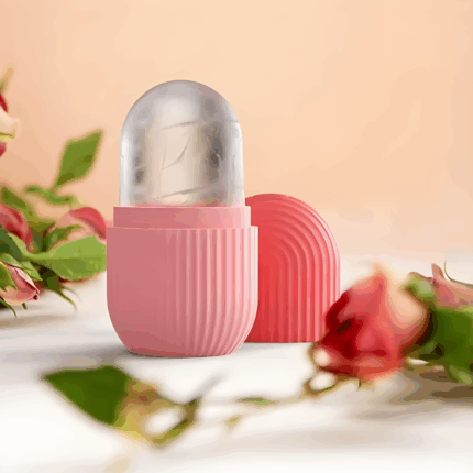 ink capsule-shaped ice roller mold on a table with roses in the background.