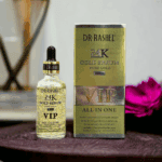 Dr Rashel 24K Gold Serum bottle with visible gold flakes placed beside its gold VIP box, featuring “Pure Gold 99.9%” and “All In One” branding.