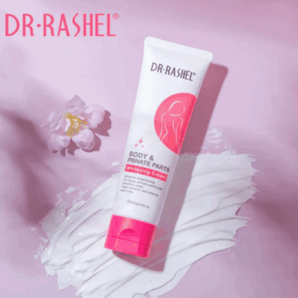 Dr Rashel Body & Private Parts Whitening Cream tube placed on a smear of white cream with soft pink flowers on a pastel pink background.