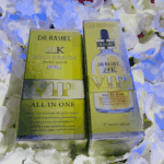 Two boxes of Dr Rashel 24K Gold Serum VIP All In One, featuring gold packaging with “Pure Gold 99.9%” and product benefits displayed.