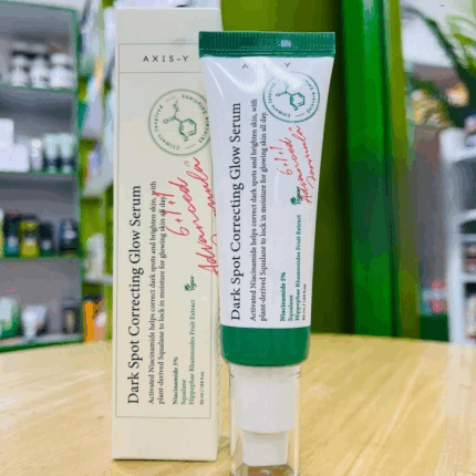 AXIS-Y Dark Spot Correcting Glow Serum displayed with original packaging box
