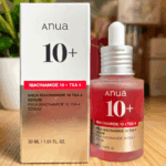Anua Niacinamide 10 plus TXA 4 serum bottle with box packaging on wooden surface