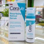 CeraVe Resurfacing Retinol Serum bottle placed in front of multiple boxes showing retail stock packaging
