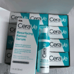 CeraVe Resurfacing Retinol Serum bottle displayed next to box packaging highlighting post acne marks and pores care