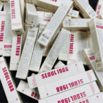 Multiple K-Secret Seoul 1988 eye cream boxes stacked showing retail packaging design
