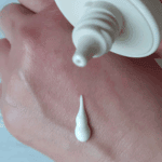 Seoul 1988 Sun Pine Tree Ceramide sunscreen cream texture applied on hand close up