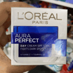L’Oréal Paris Aura Perfect Day Cream SPF 17 box showing vitamin C and tourmaline for dark spot correction