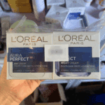 L’Oréal Paris Aura Perfect day cream and night cream combo pack sealed together for even skin tone care