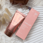 Medicube Collagen Firming Sun Cream SPF 50+ with original box flat lay