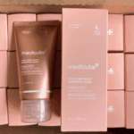 Multiple Medicube Collagen Night Wrapping Mask boxes with tube arranged for retail display