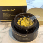 Medicube Deep Vita C Capsule Cream jar with packaging box highlighting vitamin C and niacinamide formula