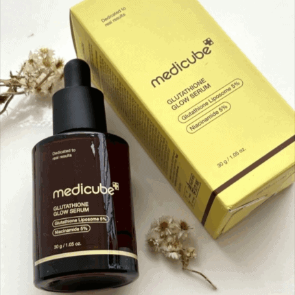 Medicube Glutathione Glow Serum bottle placed beside original yellow packaging box