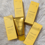 Medicube Kojic Acid Turmeric Night Wrapping Mask tube surrounded by multiple product boxes on a soft background
