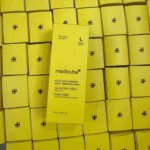 Stacked Medicube Kojic Acid Turmeric Night Wrapping Mask boxes highlighting yellow night care packaging