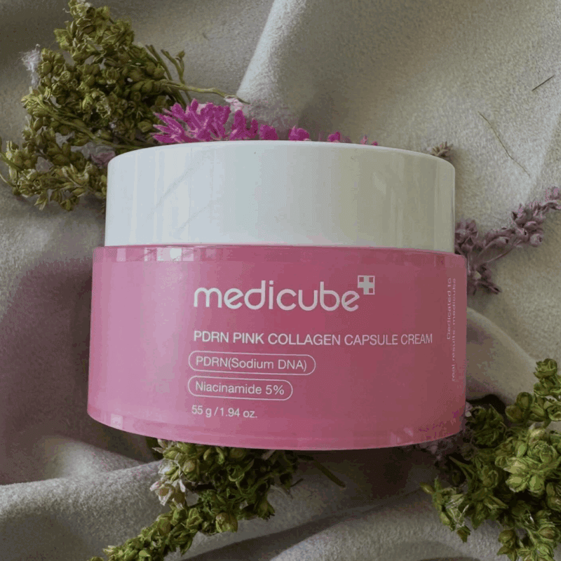 Medicube PDRN Pink Collagen Capsule Cream 55g displayed with floral background