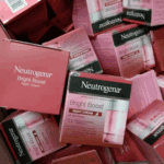 Multiple Neutrogena Bright Boost Night Cream boxes stacked together showing retail packaging design