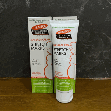 Palmer’s Cocoa Butter Formula stretch marks massage cream tube placed in front of box on tabletop display