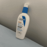 CeraVe AM Facial Moisturizing Lotion SPF 30 bottle standing on shelf, oil free daily facial moisturizer with sunscreen available in Sri Lanka