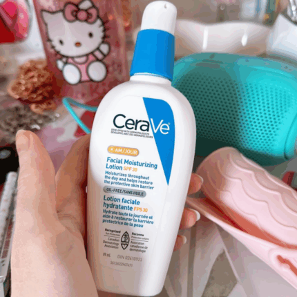 Hand holding CeraVe AM Facial Moisturizing Lotion SPF 30 bottle, oil free daily facial moisturizer with sunscreen developed by dermatologists available in Sri Lanka