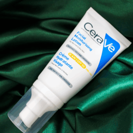 CeraVe Facial Moisturising Lotion AM SPF 50 tube on green fabric background, lightweight daily face moisturizer with broad spectrum UVA UVB protection available in Sri Lanka