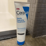 CeraVe Gentle Hydration Conditioner 266ml standing on wooden floor, original gentle hydrating hair conditioner for sensitive scalp available in Sri Lanka