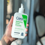 CeraVe Hydrating Facial Cleanser 236ml bottle held in hand for normal to dry skin – original cleanser available in Sri Lanka at Skinify LK