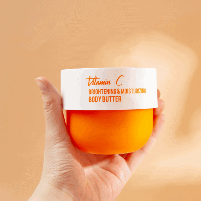 Dr Rashel vitamin C brightening and moisturizing body butter jar held in hand in Sri Lanka