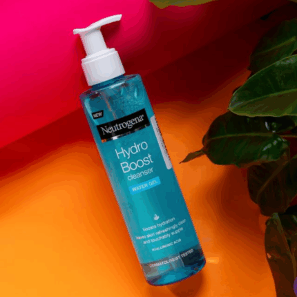Neutrogena Hydro Boost Water Gel Cleanser 200ml pump bottle flat lay on colorful background with green leaves hydrating hyaluronic acid facial cleanser Sri Lanka