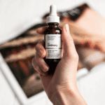 Hand holding The Ordinary Ascorbyl Glucoside Solution 12% 30ml dropper bottle brightening vitamin C serum skincare Sri Lanka