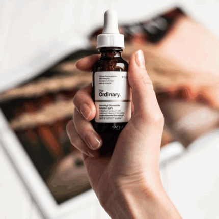 Hand holding The Ordinary Ascorbyl Glucoside Solution 12% 30ml dropper bottle brightening vitamin C serum skincare Sri Lanka