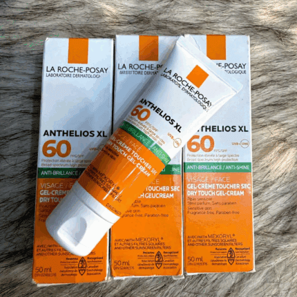 La Roche-Posay Dry Touch Gel Cream SPF 60 50ml Anthelios XL anti-shine sunscreen tube displayed with retail boxes showing broad-spectrum SPF 60 protection for face. Select 65 more words to run Humanizer.