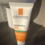 La Roche-Posay Anthelios XL Dry Touch Gel Cream SPF 60 50ml sunscreen tube placed on a surface, offering anti-shine broad-spectrum UVA and UVB protection for face.