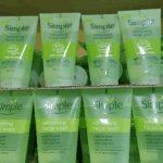 Multiple Simple Refreshing Facial Wash gel tubes arranged in rows, showcasing a gentle cleanser for sensitive skin in a retail or stock display setting